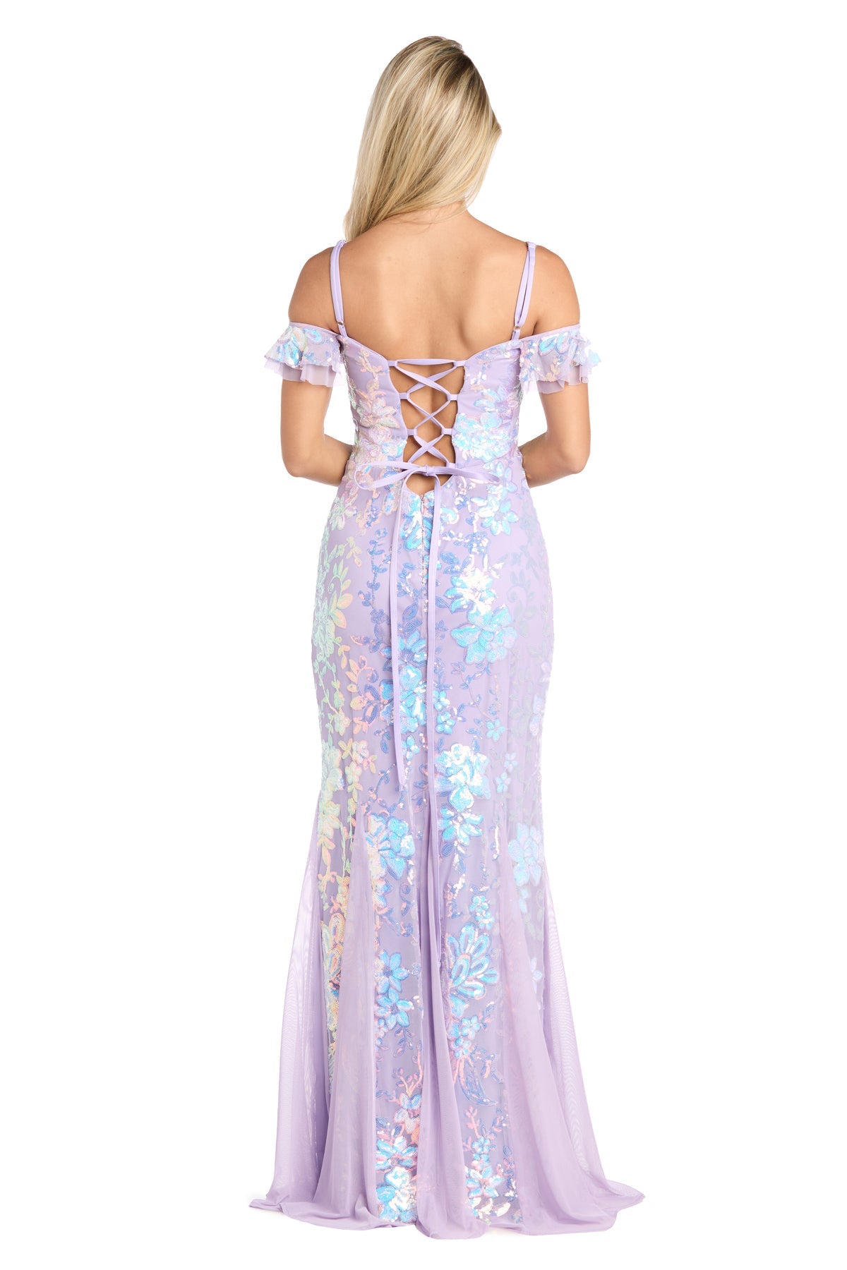 A woman faces away in the Lilac Sequin-Print Long Prom Dress (Morgan 19064), featuring an off-the-shoulder design, lace-up back, and shimmering blue floral accents—a stunning junior prom choice.